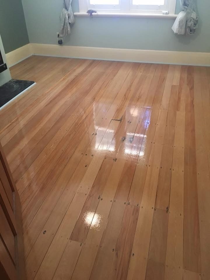 Timber floor after sanding and polishing